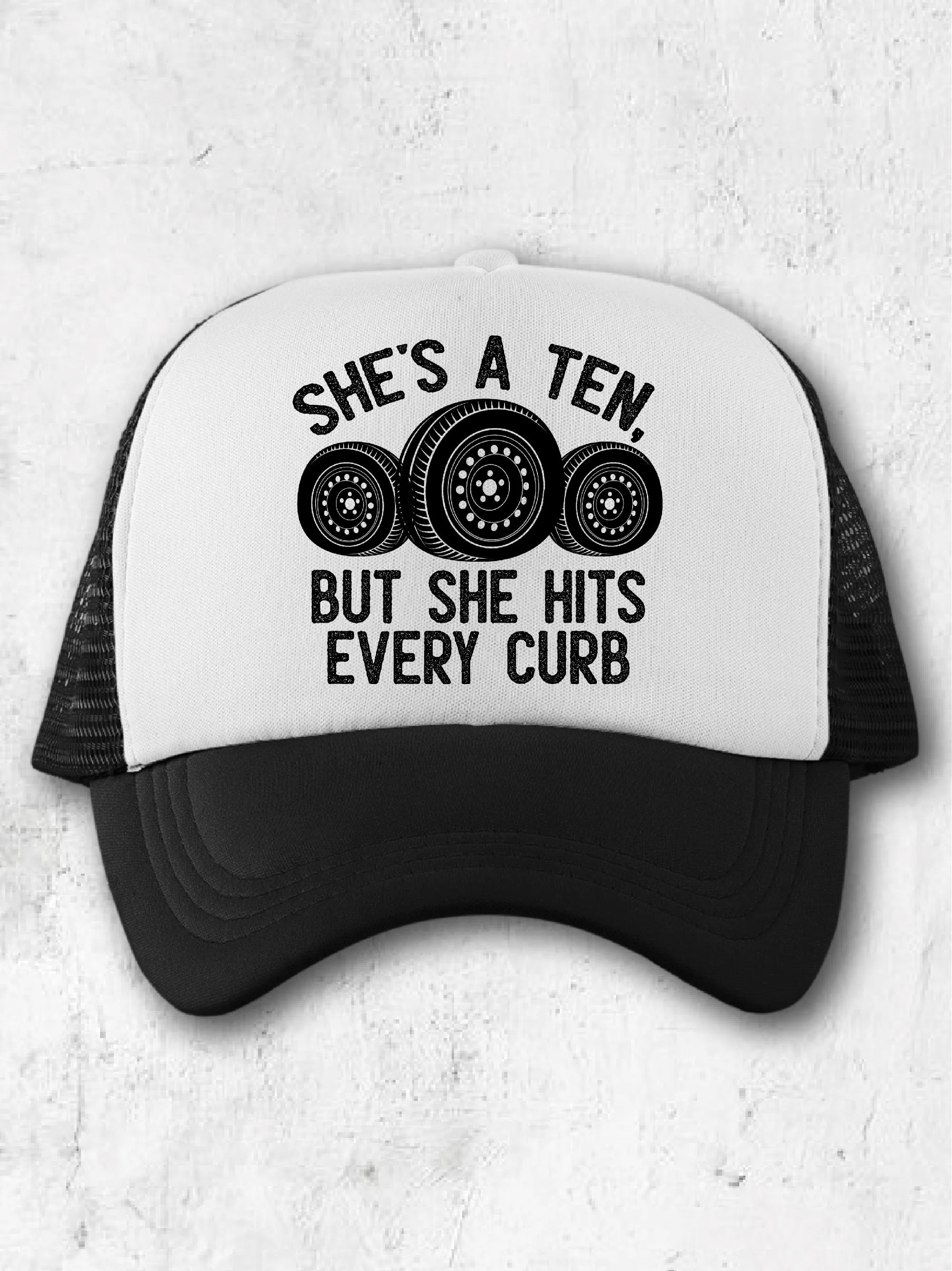 She's A Ten, But She Hits Every Curb (Hat)